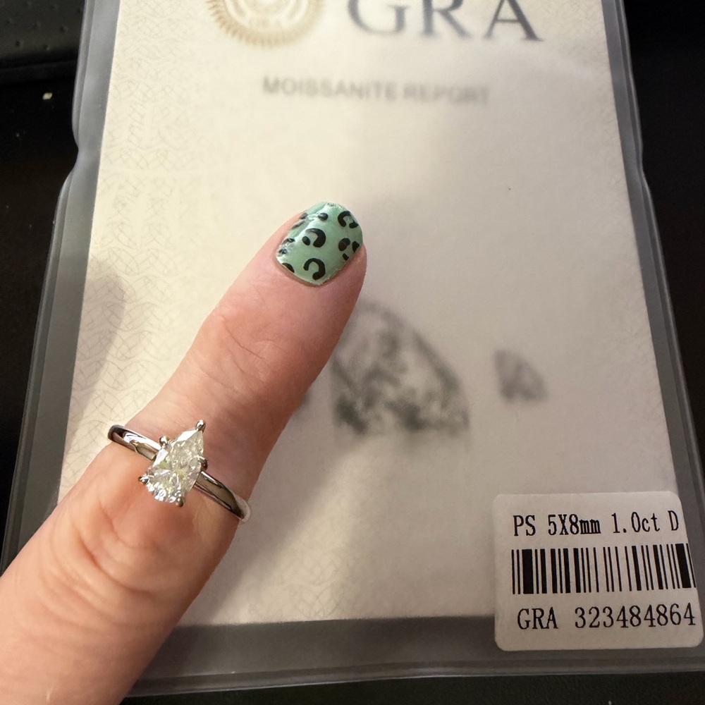 Elegant Silver moissanite pear solitaire size 7